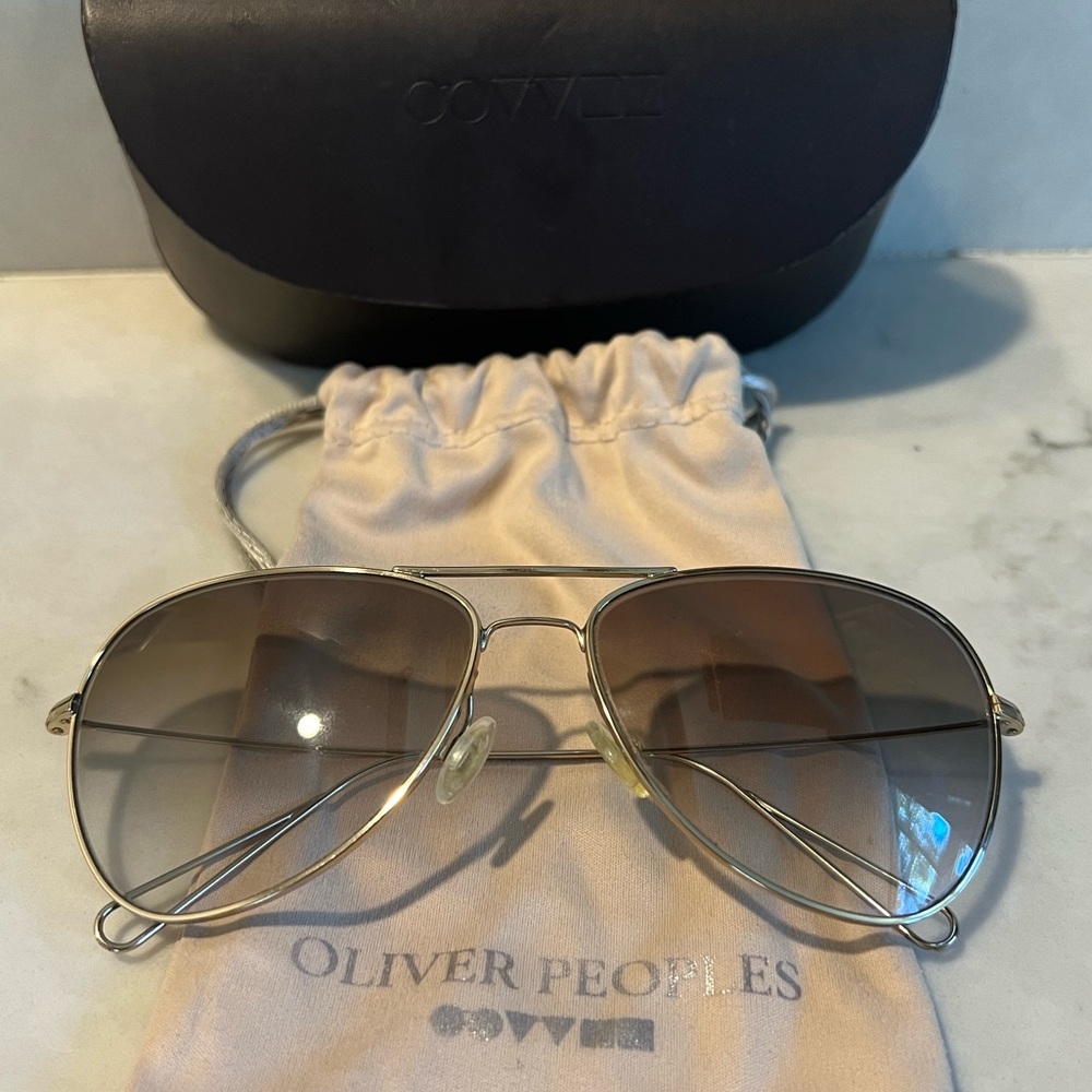 Oliver Peoples Gold Aviator Sunglasses with Brown Gradient Lenses